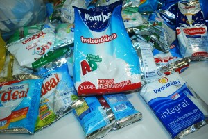 Biossegurança- entrega- leite -arrecadado -em- evento-para- o -Projeto- Crescer 11