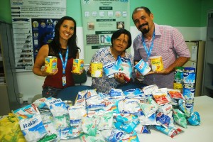 Biossegurança- entrega- leite -arrecadado -em- evento-para- o -Projeto- Crescer 11