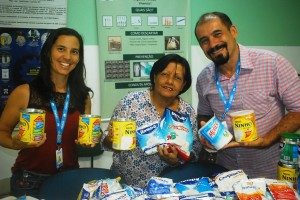 Biossegurança- entrega- leite -arrecadado -em- evento-para- o -Projeto- Crescer 11
