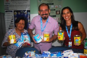 Biossegurança- entrega- leite -arrecadado -em- evento-para- o -Projeto- Crescer 11